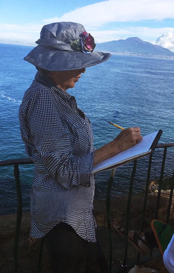 Eva Margueriette Art Retreats - Eva Painting in Sorrento, Italy (Mt. Vesuvius in the background)